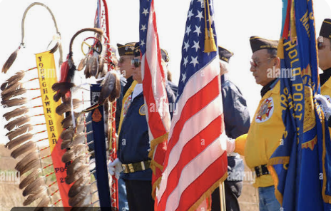 MHA veterans color guard with the United States flag and an eagle staff